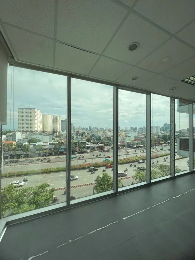 Office floor with floor-to-ceiling glass overlooking Dien Bien Phu